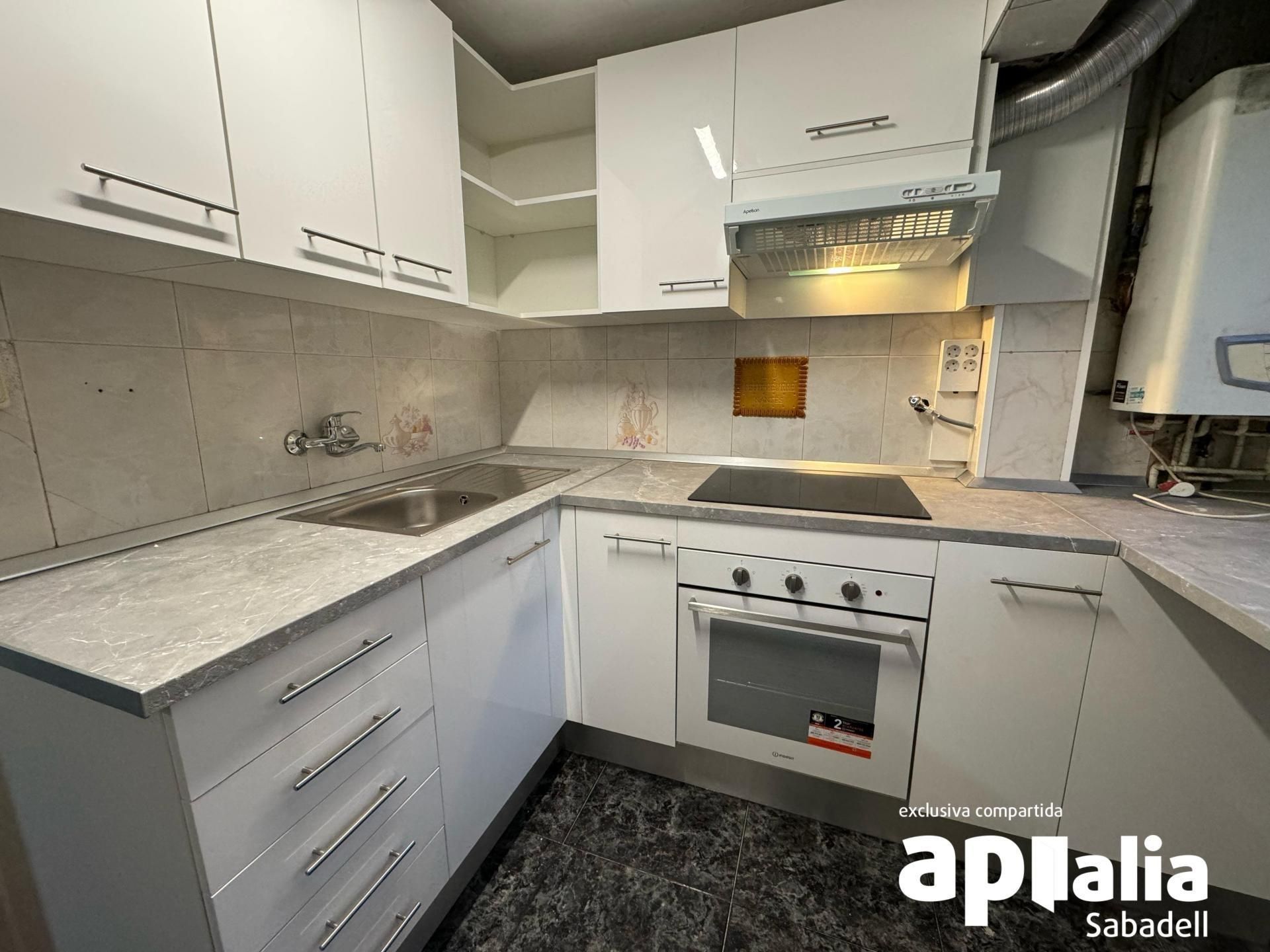 Kitchen of Flat for sale in Sabadell  with Air Conditioner, Heating and Alarm