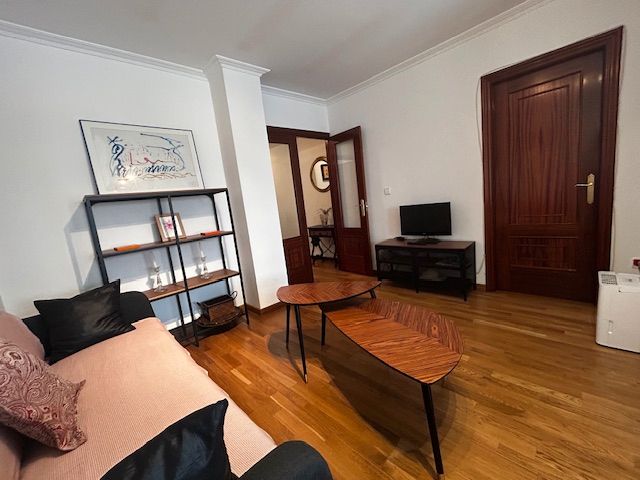 Sala de estar de Apartamento en venta en Sanxenxo con Terraza, Trastero y Amueblado