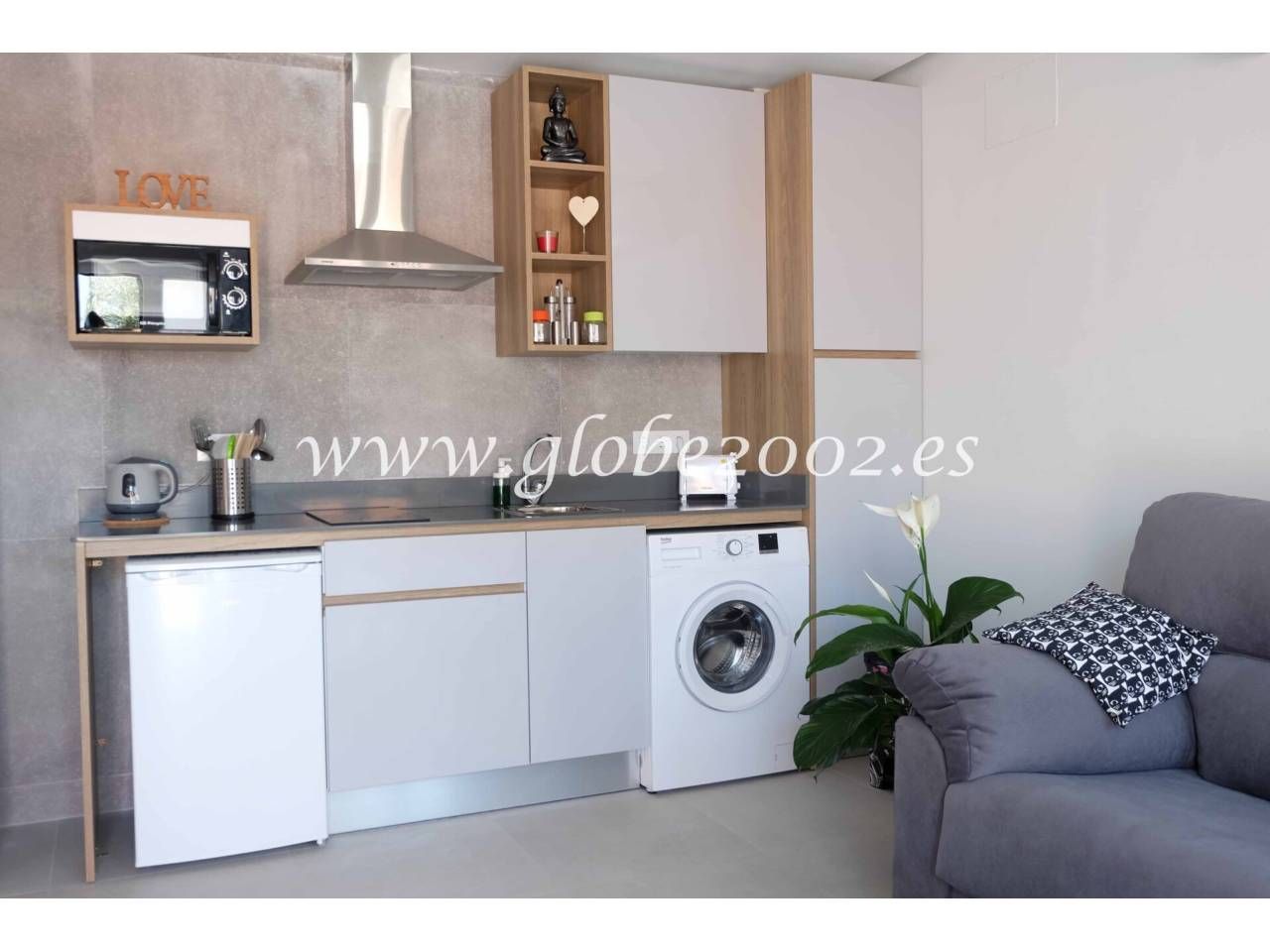Cuina de Apartament de lloguer en Chiclana de la Frontera amb Aire condicionat, Moblat i Piscina comunitària