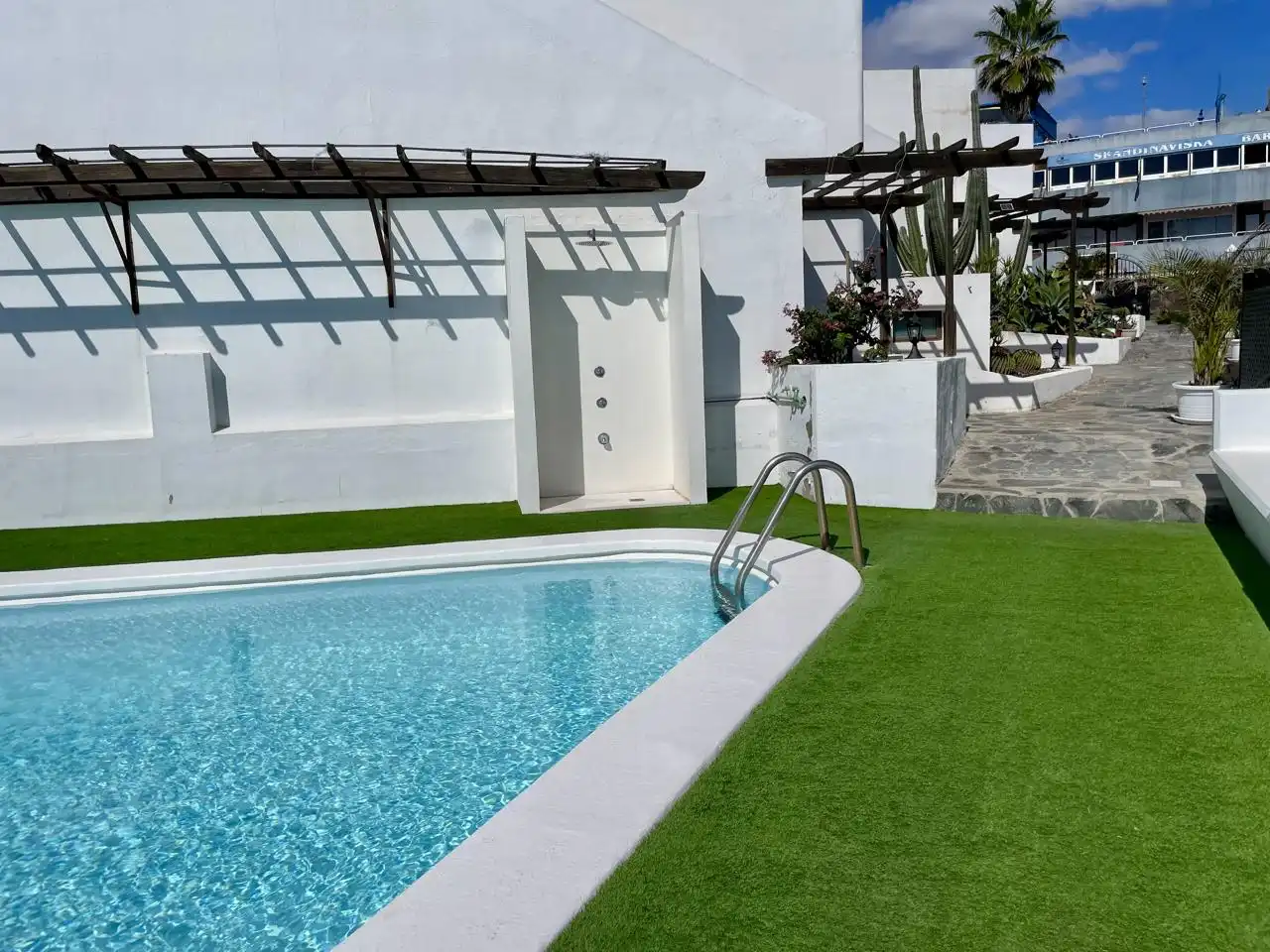 Piscina de Dúplex de lloguer en San Bartolomé de Tirajana amb Aire condicionat, Jardí privat i Terrassa