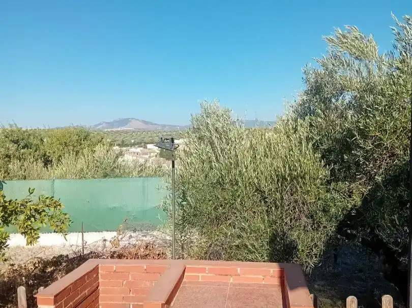Casa adosada en venda en Martos amb Jardí privat, Traster i Piscina