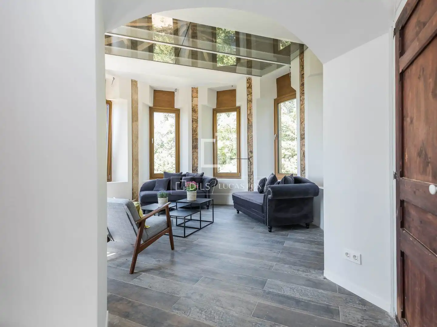 Sala de estar de Finca rústica en venta en Sant Hilari Sacalm con Aire acondicionado, Calefacción y Jardín privado