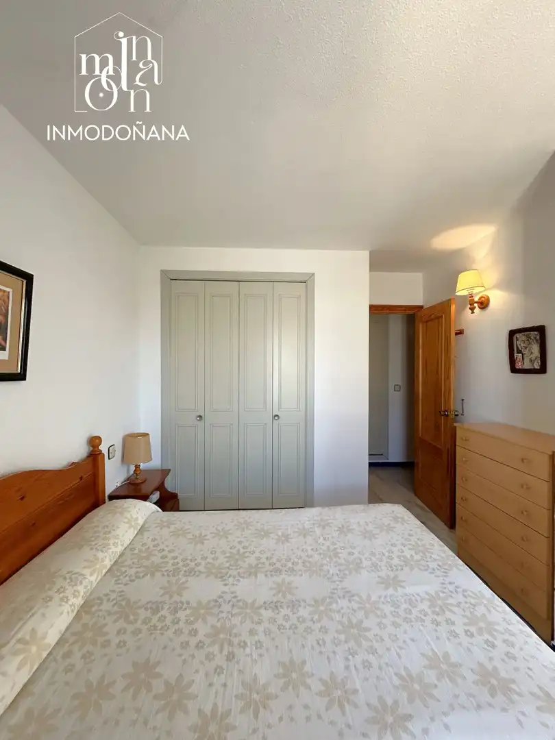 Habitación de Casa adosada en venta en Almonte con Terraza, Piscina y Amueblado