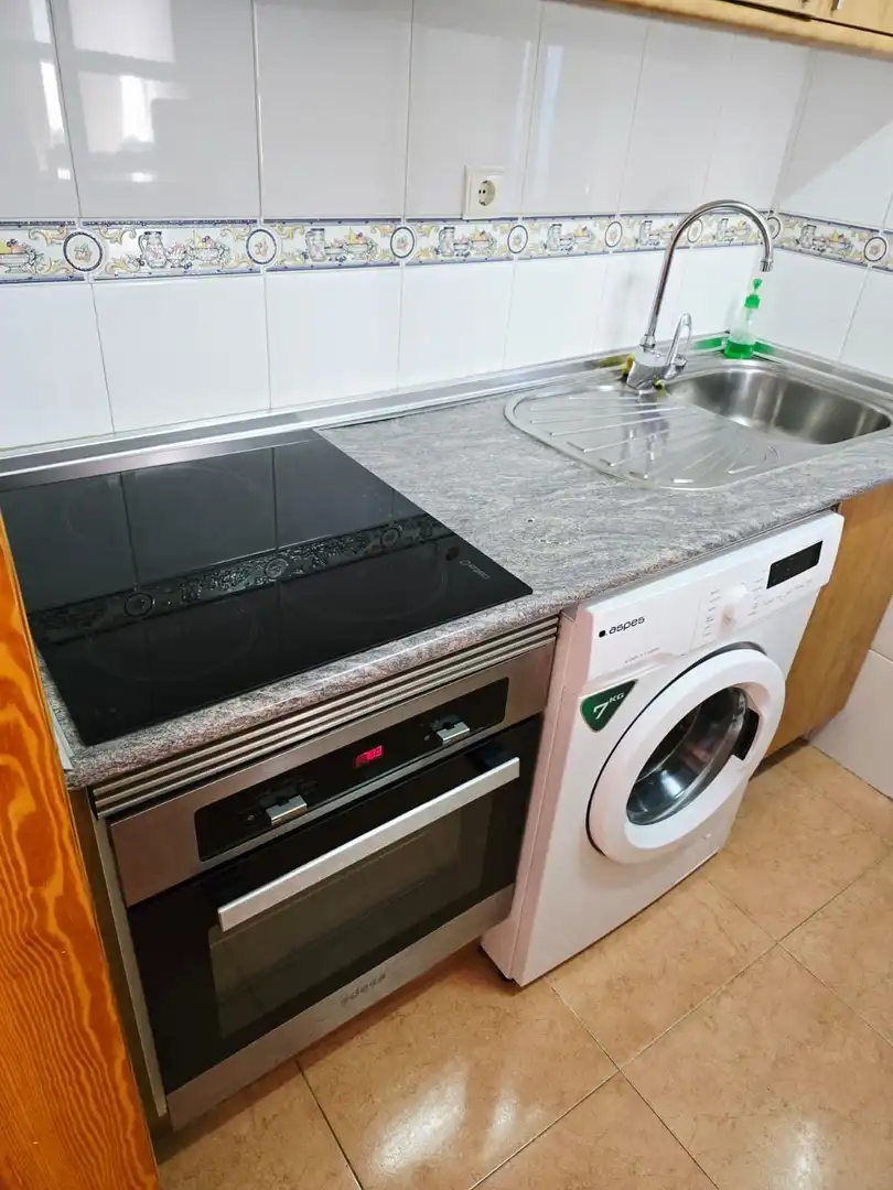 Cuina de Apartament en venda en Benidorm amb Aire condicionat, Moblat i Piscina comunitària