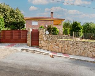 Vista exterior de Casa o xalet en venda en El Boalo - Cerceda – Mataelpino amb Calefacció i Piscina comunitària