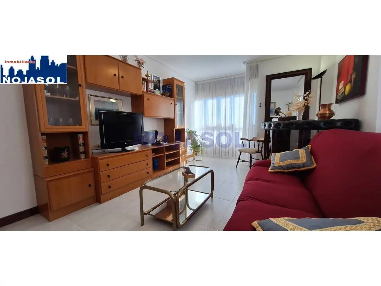 Sala d'estar de Dúplex de lloguer en Noja amb Calefacció, Terrassa i Moblat