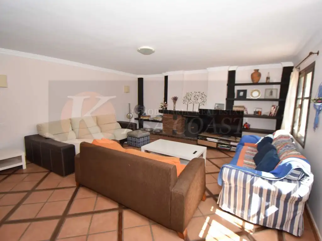 Sala de estar de Casa adosada en venta en Fuengirola con Aire acondicionado, Jardín privado y Terraza