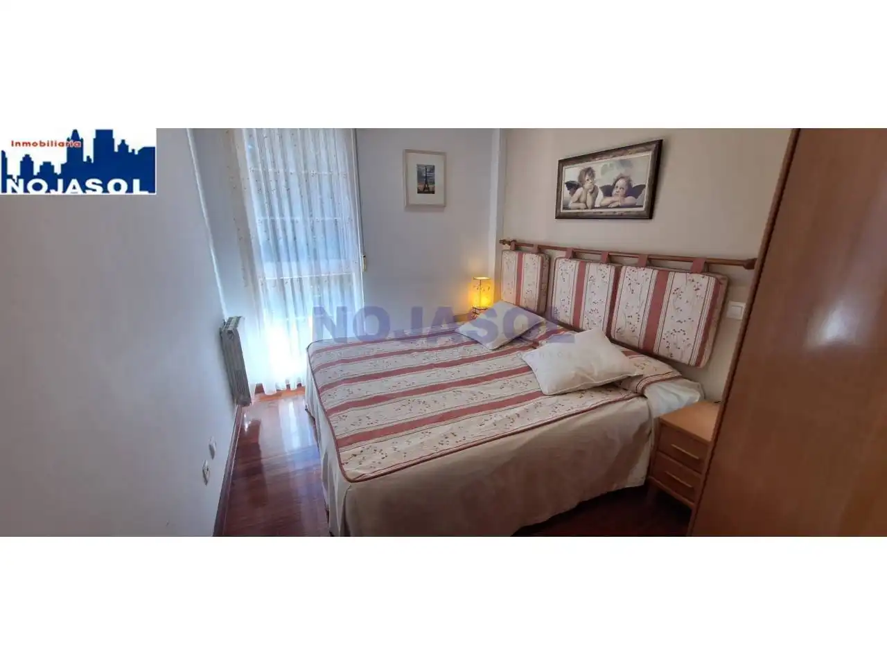 Dormitori de Apartament de lloguer en Noja amb Calefacció, Terrassa i Moblat