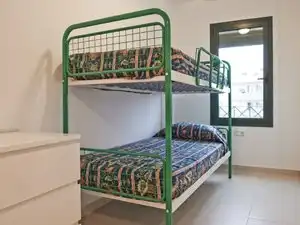 Dormitori de Apartament de lloguer en Torredembarra amb Aire condicionat, Calefacció i Moblat