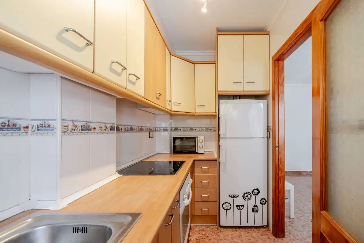 Küche von Erdgeschoss zum Verkauf in Santa Pola mit Heizung, Privatgarten und Terrasse