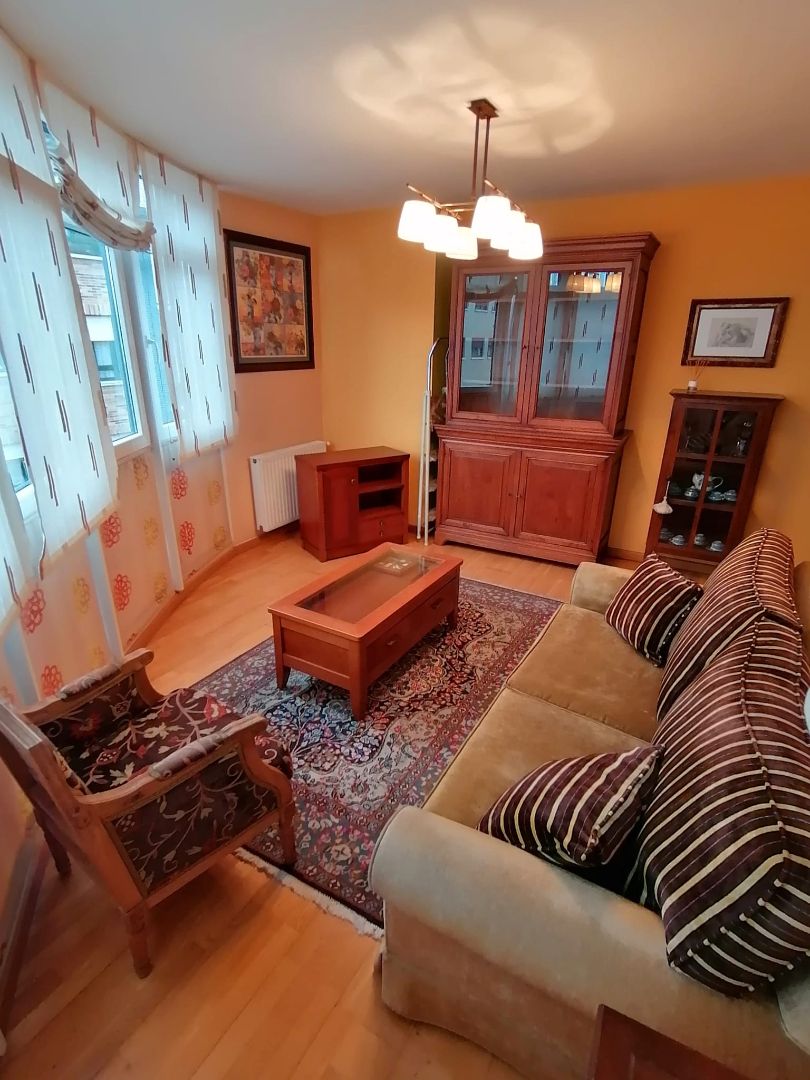 Living room of Flat for sale in Gijón   with Heating, Parquet flooring and Storage room