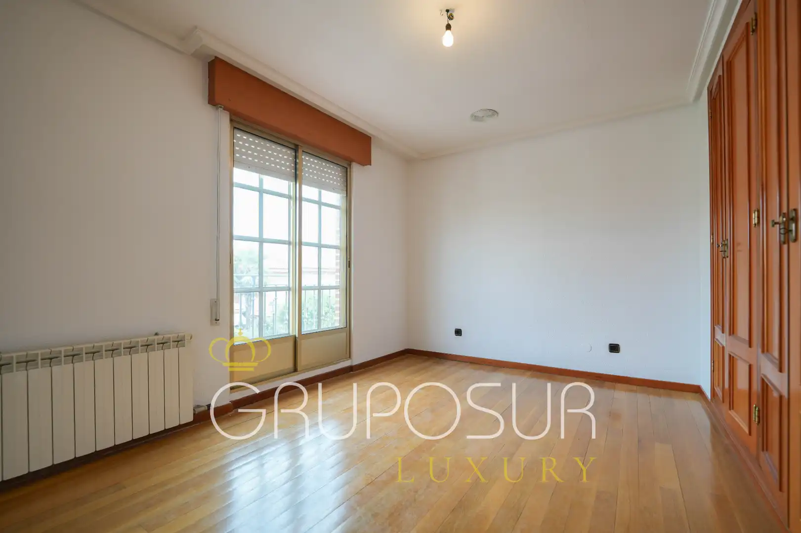 Sala d'estar de Casa adosada en venda en Laguna de Duero amb Calefacció, Jardí privat i Parquet