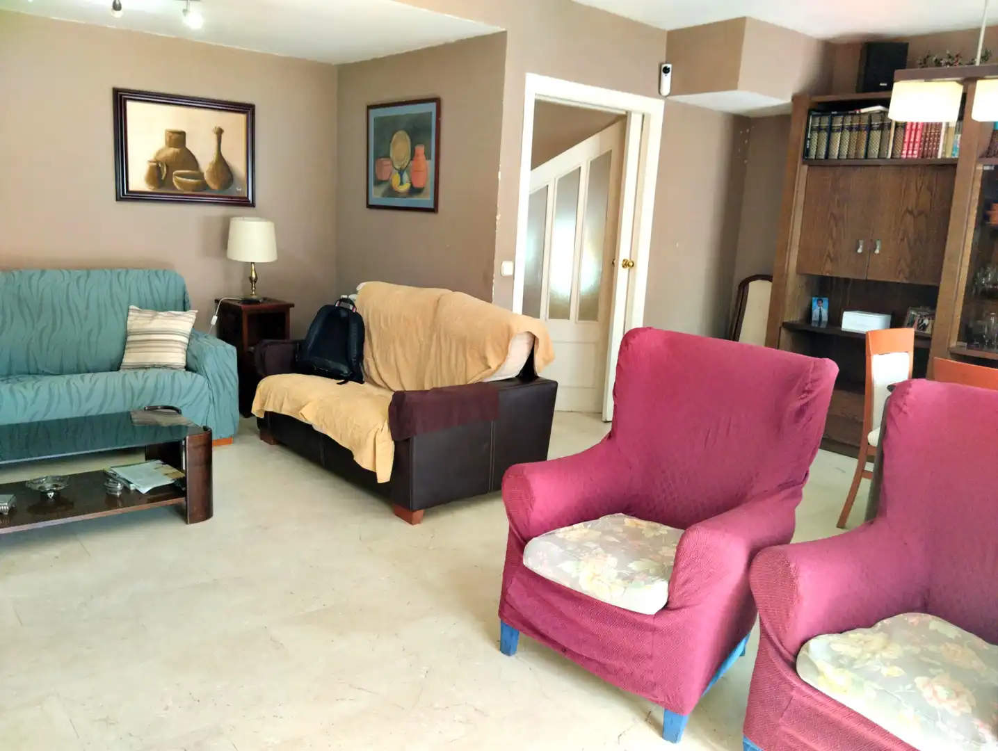 Sala de estar de Casa adosada en venta en San Lorenzo de El Escorial con Aire acondicionado, Calefacción y Jardín privado