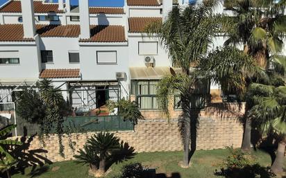 Exterior view of House or chalet for sale in El Portil  with Private garden and Community pool