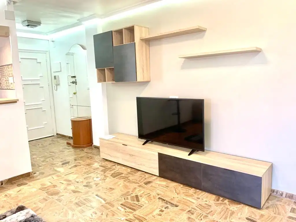 Sala d'estar de Apartament en venda en Alicante / Alacant amb Aire condicionat, Terrassa i Moblat