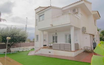 Vista exterior de Casa o xalet en venda en San Antonio de Benagéber amb Aire condicionat, Calefacció i Jardí privat