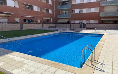 Swimming pool of Flat for sale in Lloret de Mar  with Air Conditioner, Heating and Community pool