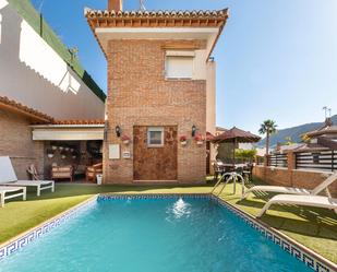 Piscina de Casa adosada en venda en  Granada Capital amb Aire condicionat, Calefacció i Jardí privat