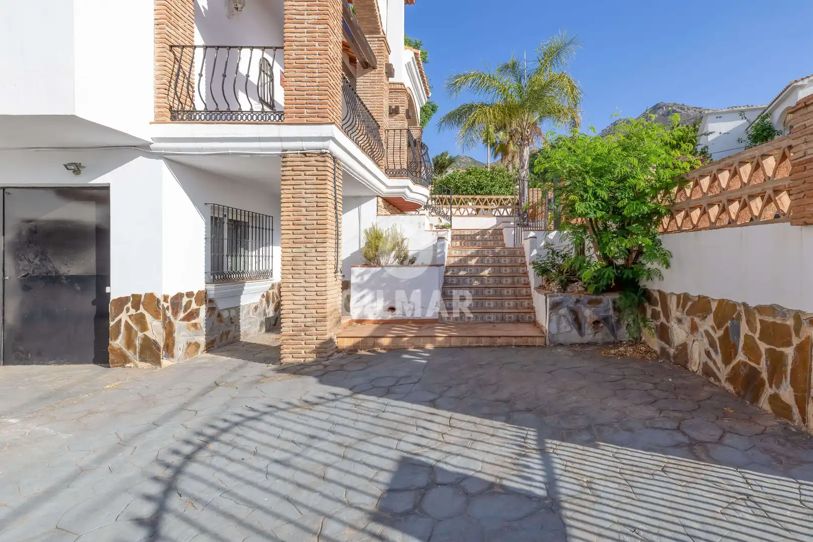 Vista exterior de Casa o chalet en venta en Benalmádena con Calefacción, Jardín privado y Piscina