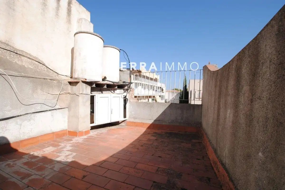 Casa adosada en venda a Centre Vila