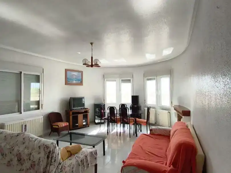 Sala d'estar de Casa o xalet en venda en Rojales amb Jardí privat, Piscina i Moblat