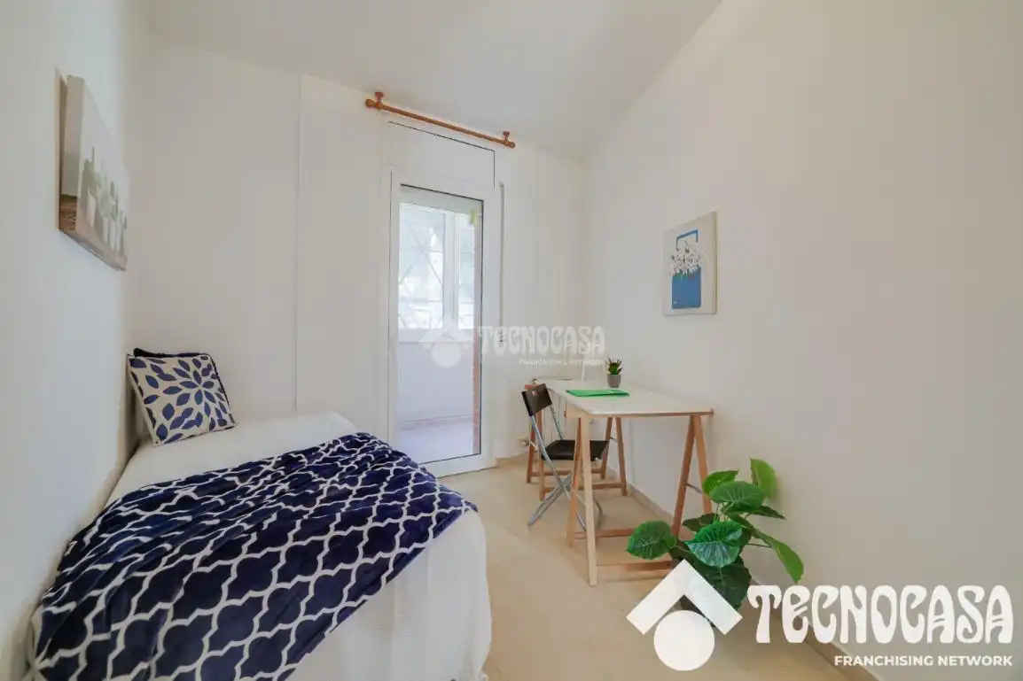 Schlafzimmer von Wohnung zum Verkauf in Barcelona mit Klimaanlage und Balkon
