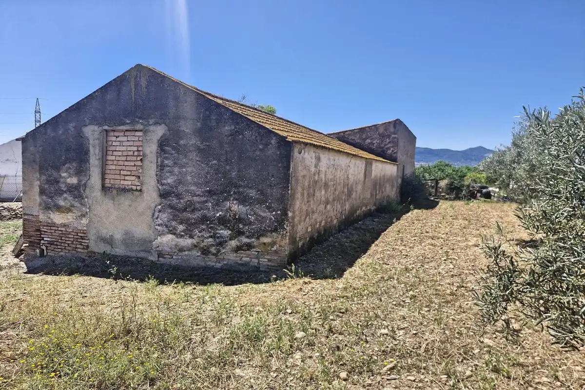 Vista exterior de Finca rústica en venda en Málaga amb Jardí privat, Terrassa i Traster