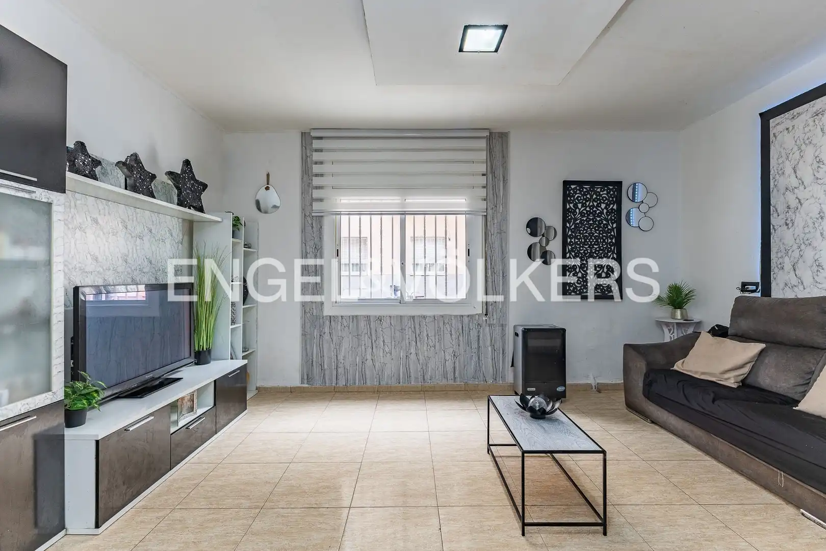 Sala de estar de Casa adosada en venta en Sabadell con Aire acondicionado, Calefacción y Terraza