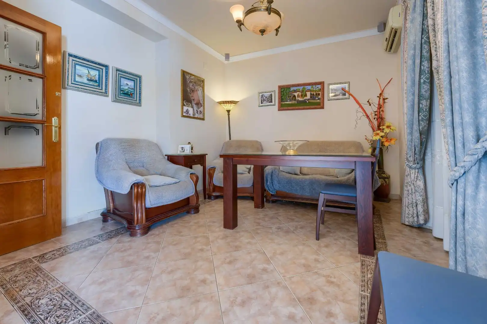 Sala de estar de Casa adosada en venta en La Palma del Condado con Aire acondicionado, Calefacción y Terraza