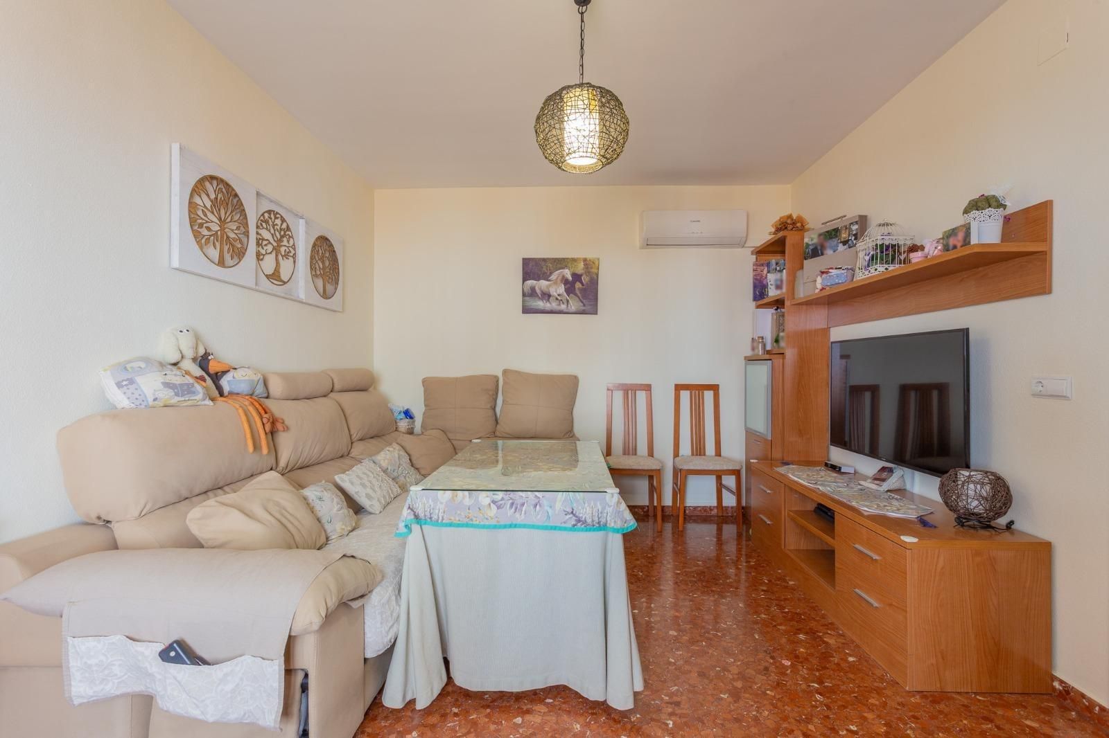 Sala de estar de Casa adosada en venta en Peligros con Aire acondicionado, Calefacción y Terraza