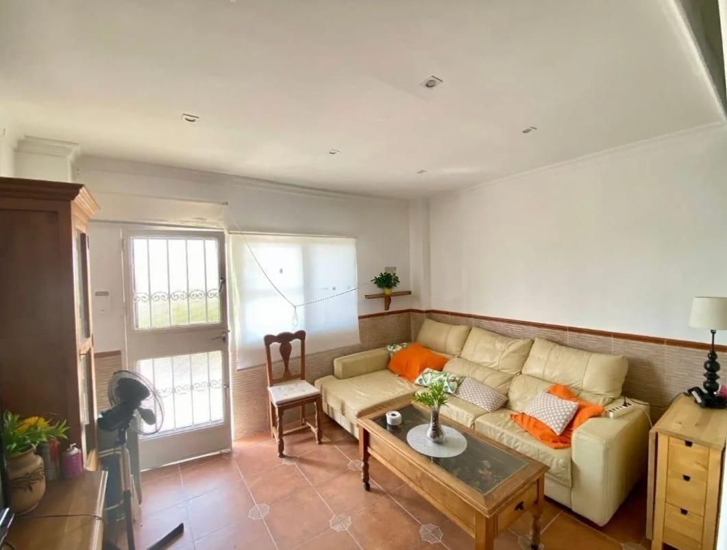 Sala d'estar de Apartament en venda en Torremolinos amb Aire condicionat i Jardí privat