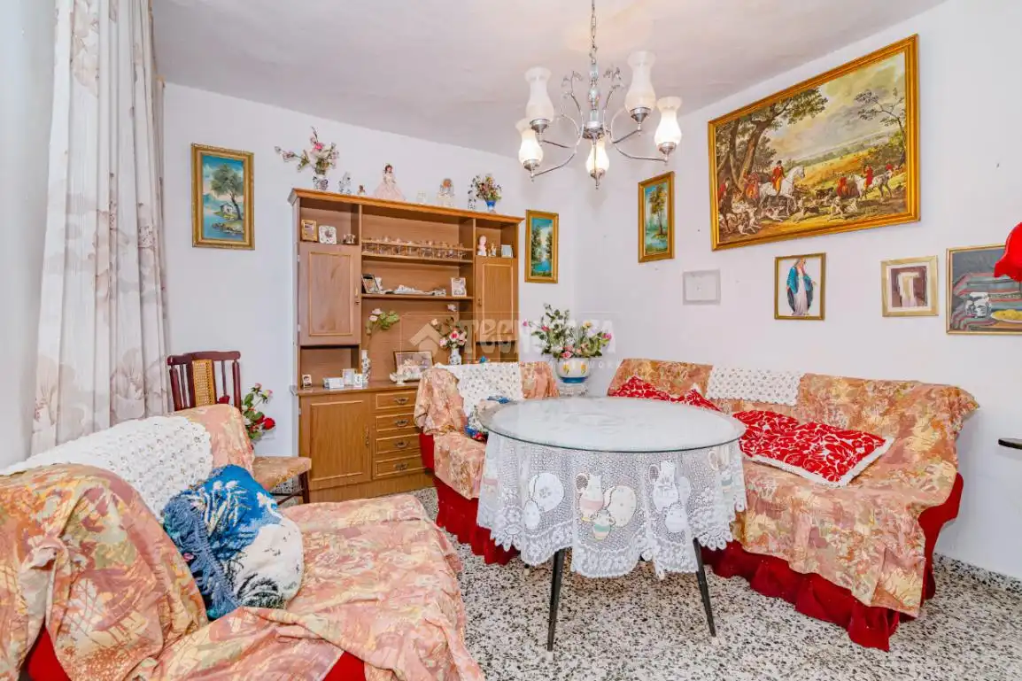 Sala de estar de Casa adosada en venta en Alhendín con Terraza