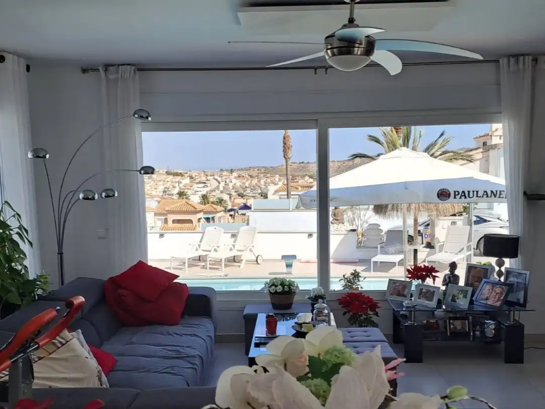 Sala d'estar de Casa o xalet en venda en Rojales amb Aire condicionat, Jardí privat i Terrassa