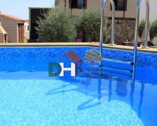 Swimming pool of House or chalet for sale in Valdefuentes  with Air Conditioner and Swimming Pool