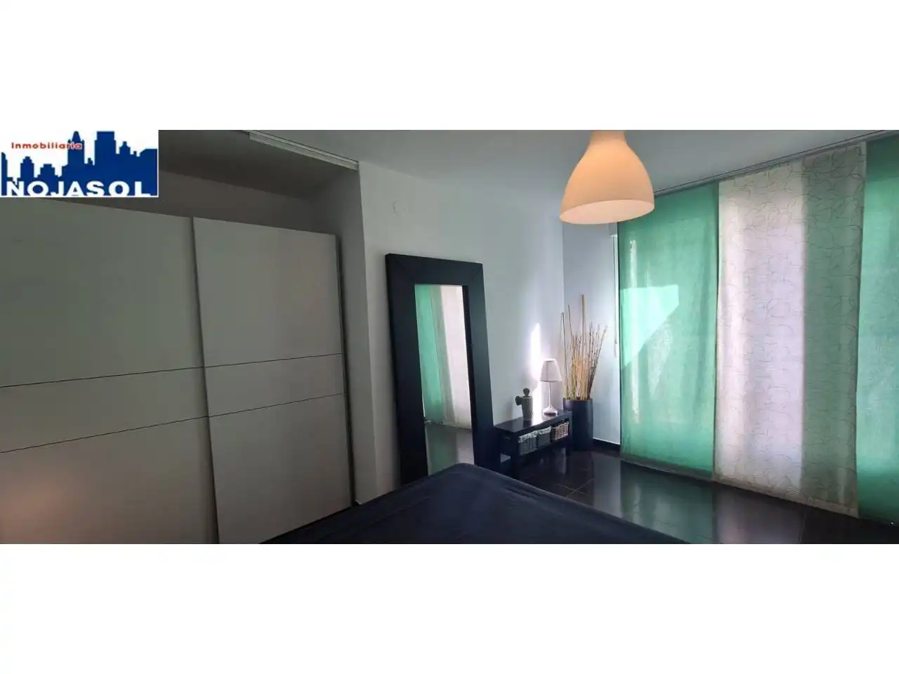 Dormitori de Apartament de lloguer en Noja amb Calefacció, Terrassa i Moblat