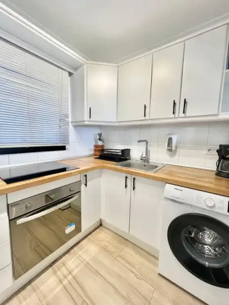 Kitchen of Flat for sale in Mijas  with Air Conditioner, Terrace and Swimming Pool