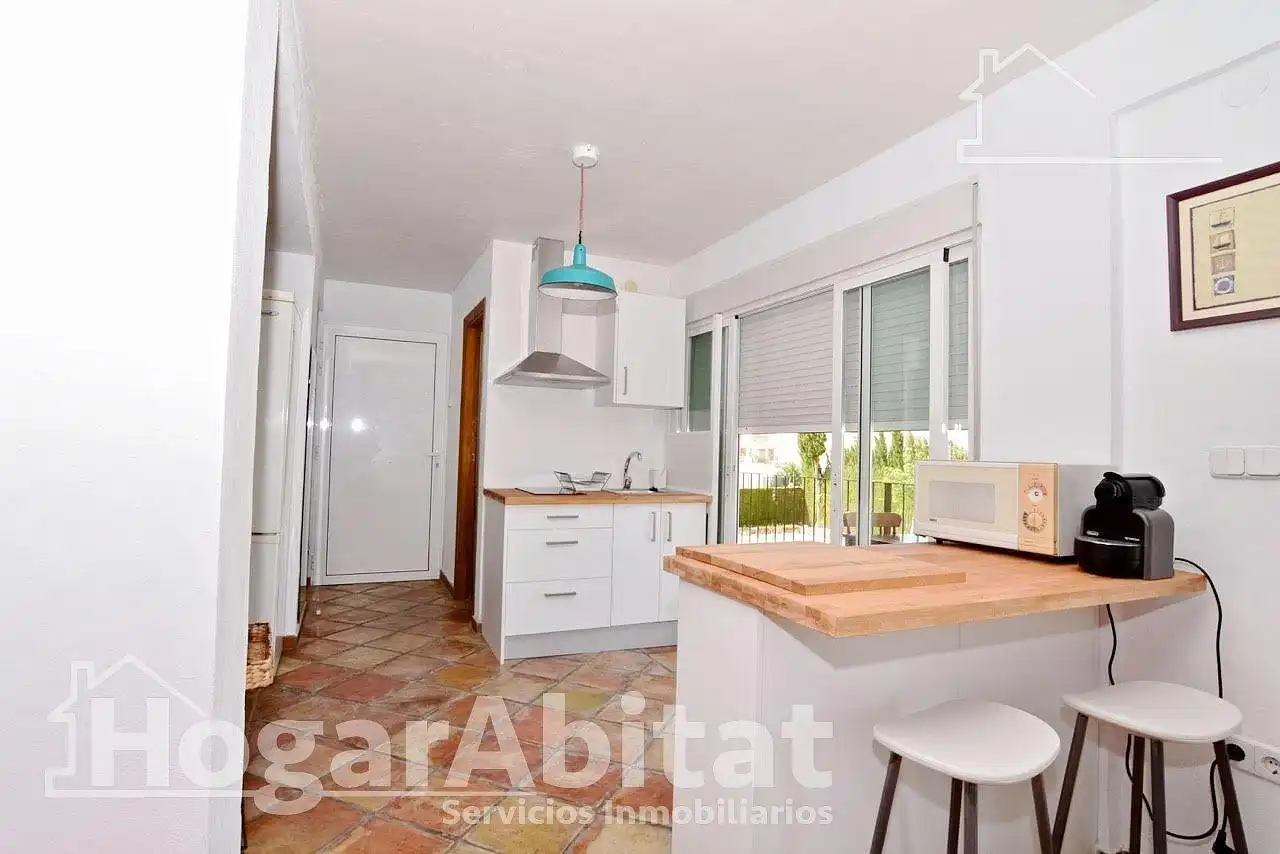Cuina de Casa o xalet en venda en Oliva amb Aire condicionat, Jardí privat i Terrassa