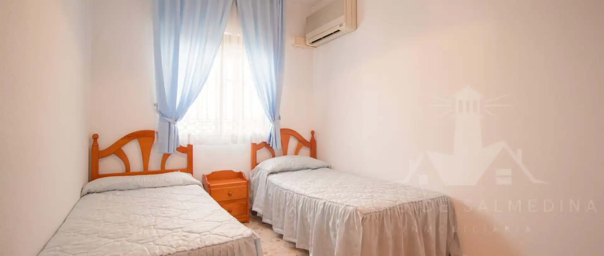 Habitación de Casa adosada en venta en Chipiona con Aire acondicionado, Trastero y Amueblado