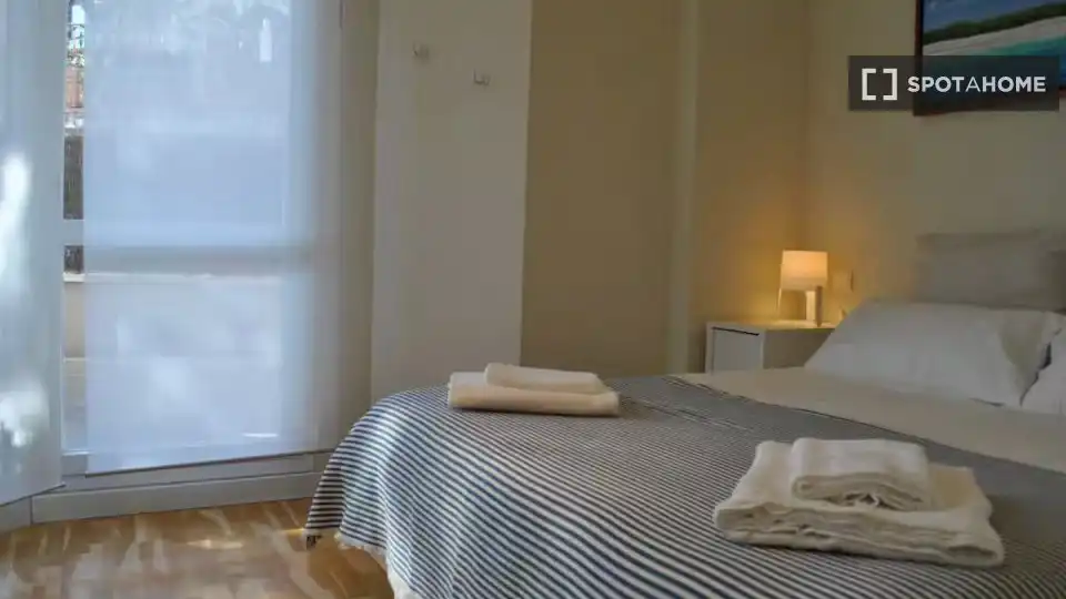 Habitación de Apartamento para compartir en Málaga con Aire acondicionado, Terraza y Amueblado