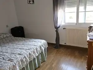 Habitación de Casa adosada en venta en Coslada con Aire acondicionado, Calefacción y Jardín privado
