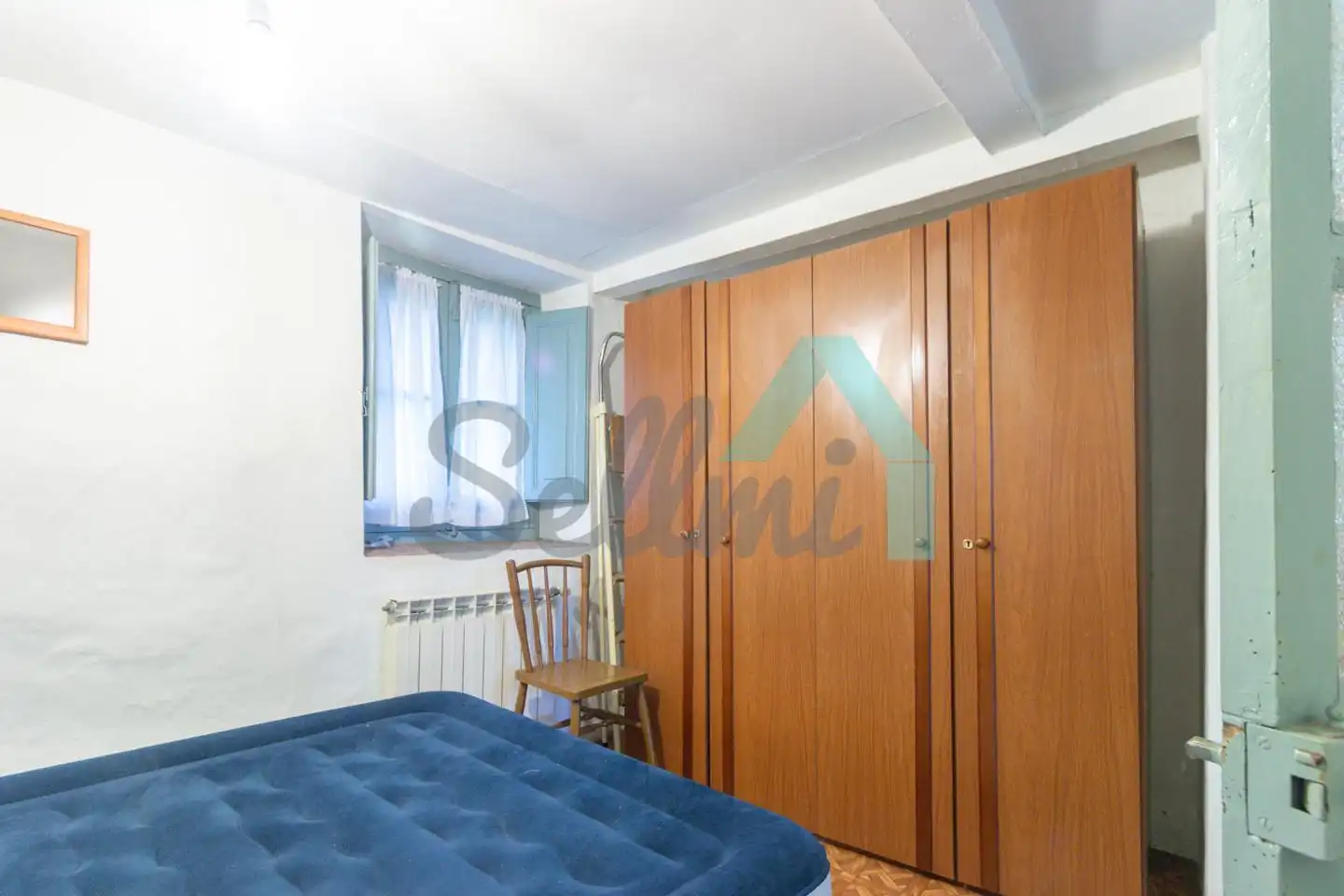 Habitación de Casa adosada en venta en Quirós con Calefacción y Trastero