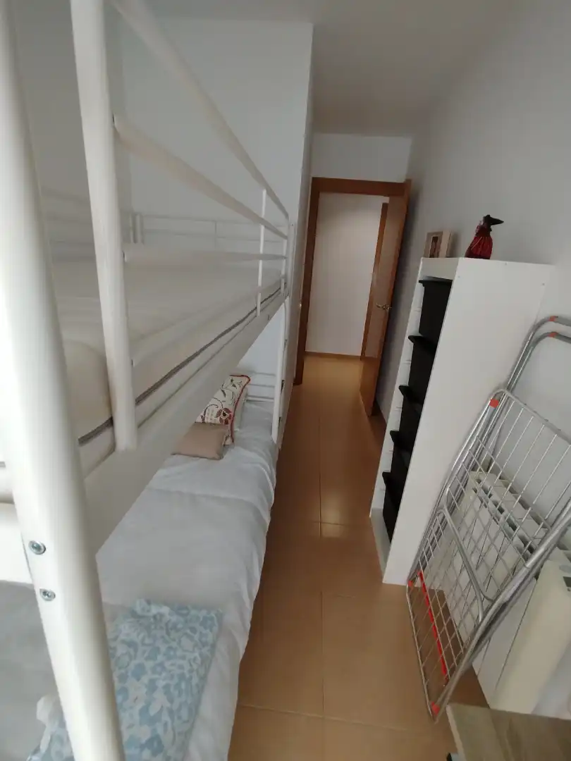 Schlafzimmer von Wohnung zum Verkauf in Vilallonga del Camp mit Klimaanlage, Heizung und Privatgarten