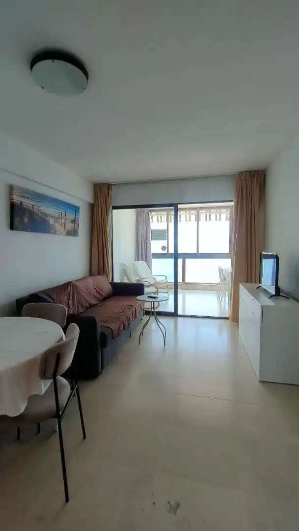Sala de estar de Apartamento en venta en Benidorm con Aire acondicionado, Amueblado y Piscina comunitaria