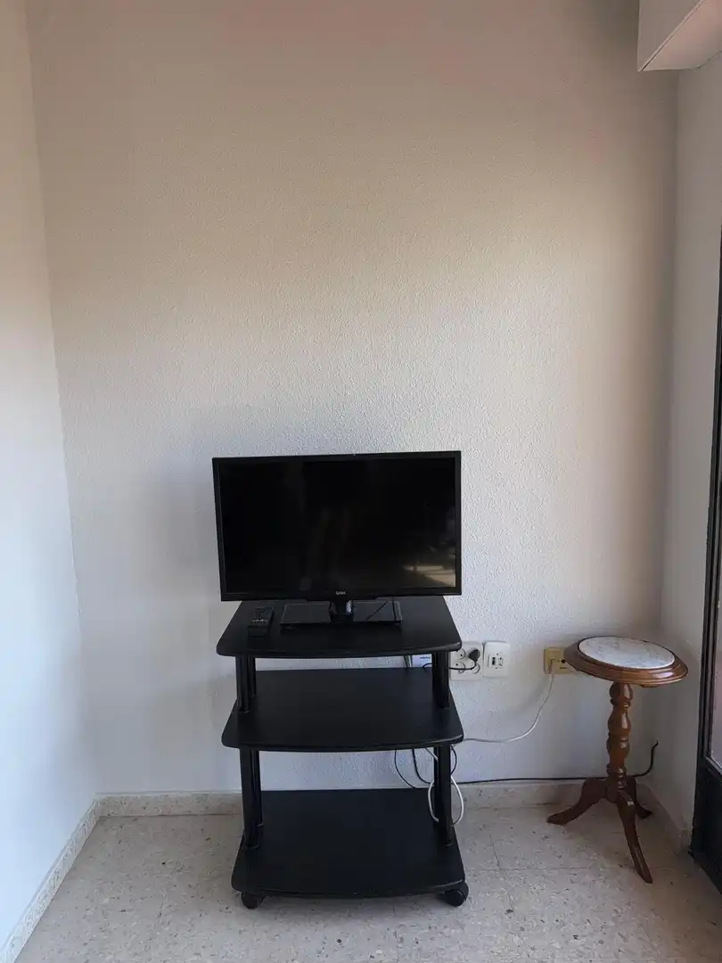 Living room of Flat for share in Granada  with Air Conditioner, Terrace and Furnished