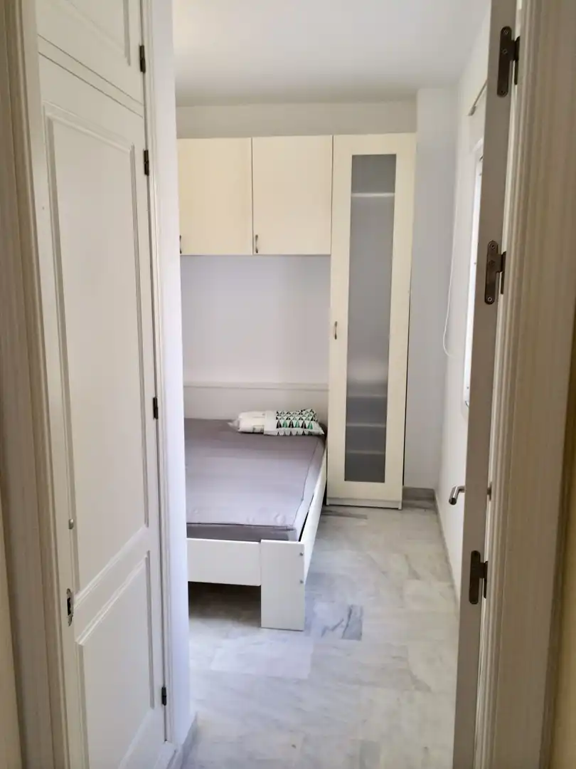 Schlafzimmer von Wohnung zum Verkauf in Sanlúcar la Mayor mit Klimaanlage, Heizung und Abstellraum