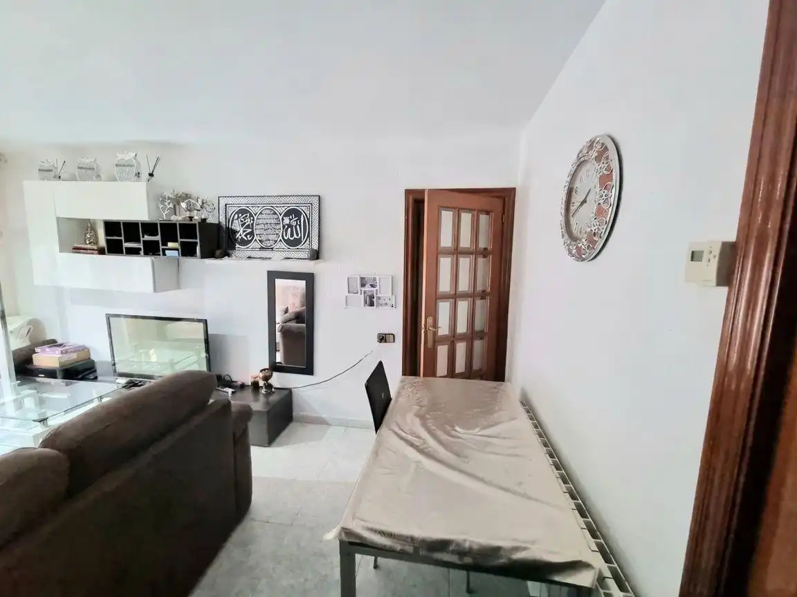 Living room of Flat for sale in Sabadell  with Heating, Furnished and Balcony