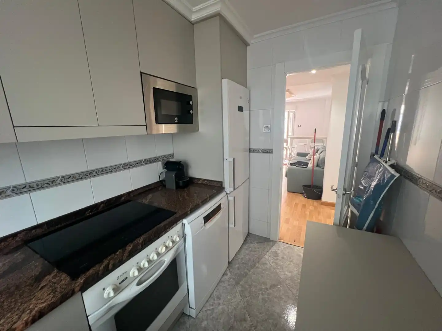 Kitchen of Flat for rent in Gijón   with Heating, Furnished and Oven