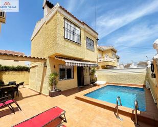 Exterior view of Duplex for sale in Torrevieja  with Air Conditioner, Terrace and Storage room