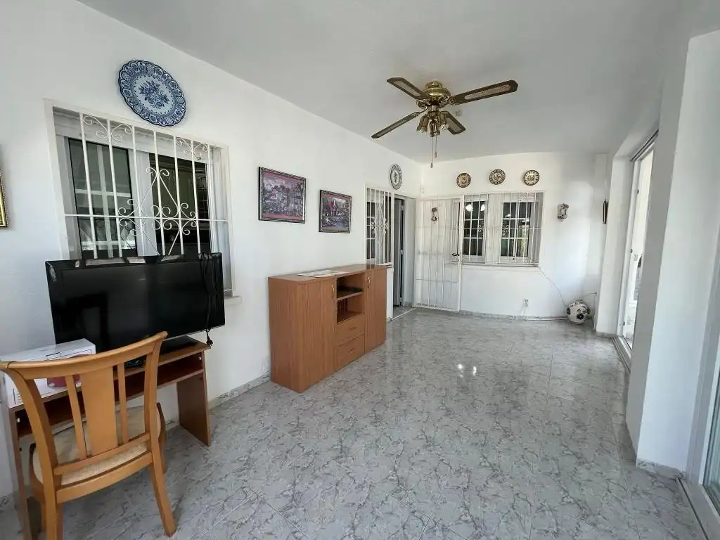 Sala d'estar de Casa o xalet en venda en Los Alcázares amb Aire condicionat, Jardí privat i Terrassa