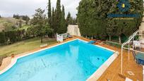 Swimming pool of House or chalet for sale in  Granada Capital  with Air Conditioner, Heating and Private garden
